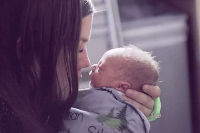 Photo of mother holding baby to illustrate treatment for postpartum OCD in Houston, Texas