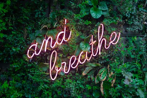 Image of a sign that says breathe to illustrate self-care and therapy in houston, texas