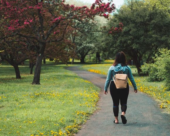 Image of a woman walking to illustrate self-care and therapy in Houston, Texas